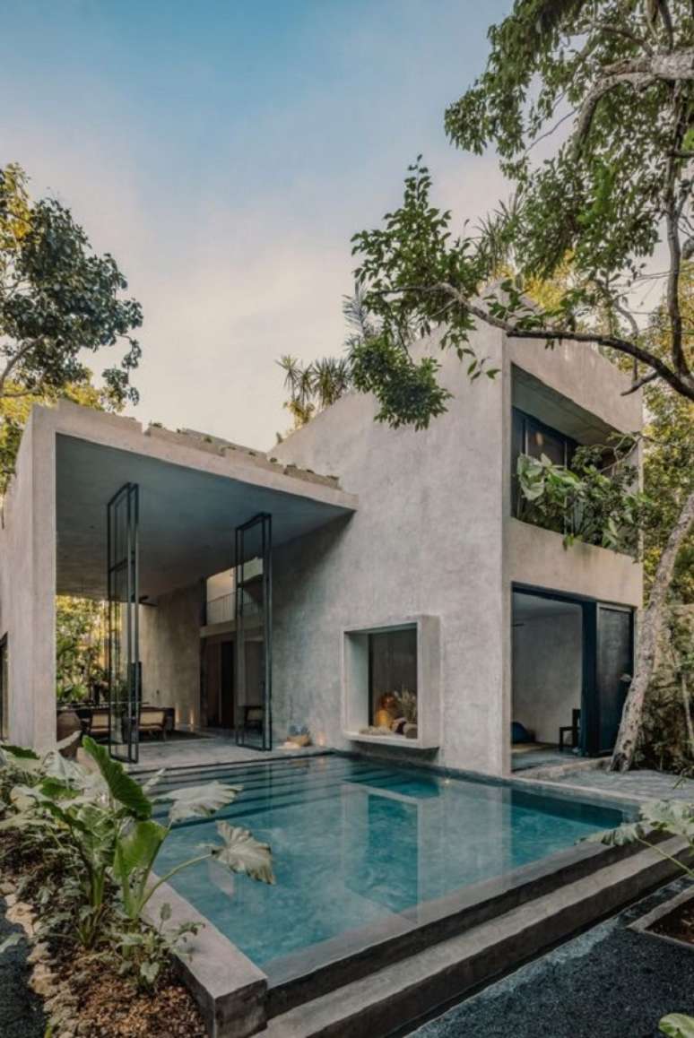 1. Casa chique com piscina quadrada – Foto Dezeen