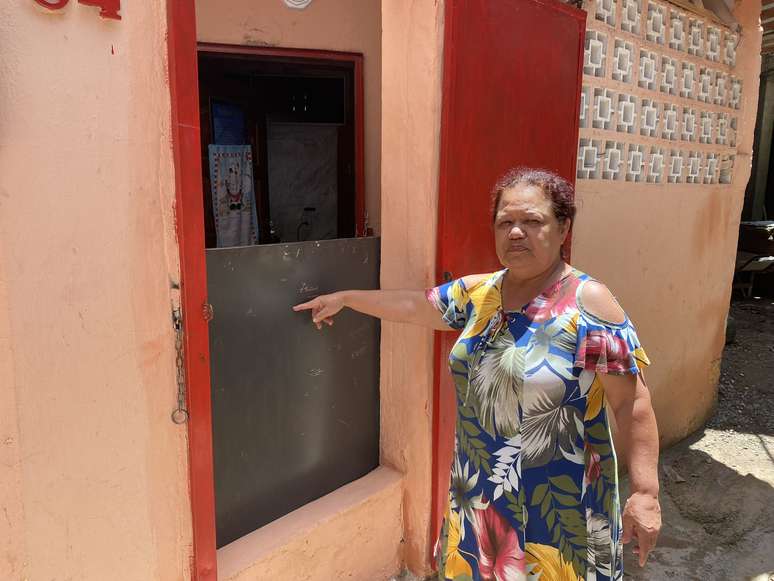 Prevendo as enchentes, Dilma Ribeiro Loureiro tinha uma meia porta de ferro na entrada de casa @Cleber Arruda/Agência Mural