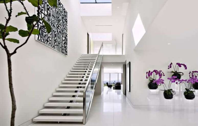 3. Decora&ccedil;&atilde;o cl&aacute;ssica e elegante com claraboia. Fonte: Lima Alves Arquitetura