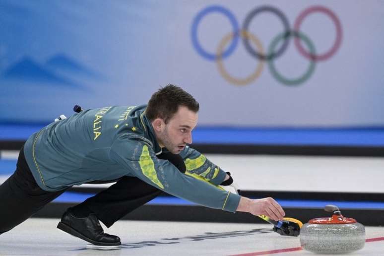 Curling é uma das modalidades mais conhecidas dos Jogos Olímpicos de Inverno (Foto: SEBASTIEN BOZON / AFP)