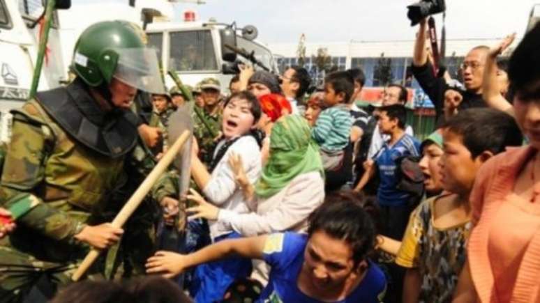 Repressão em Xinjiang foi um dos motivos para autoridades de países do Ocidente boicotarem evento (Foto: Peter Parks / AFP)