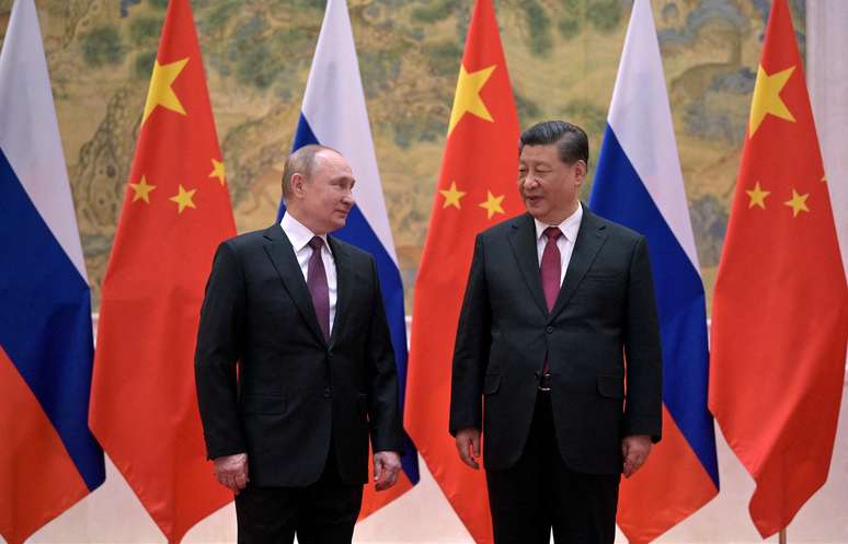 Putin e Xi Jinping durante encontro em Pequim