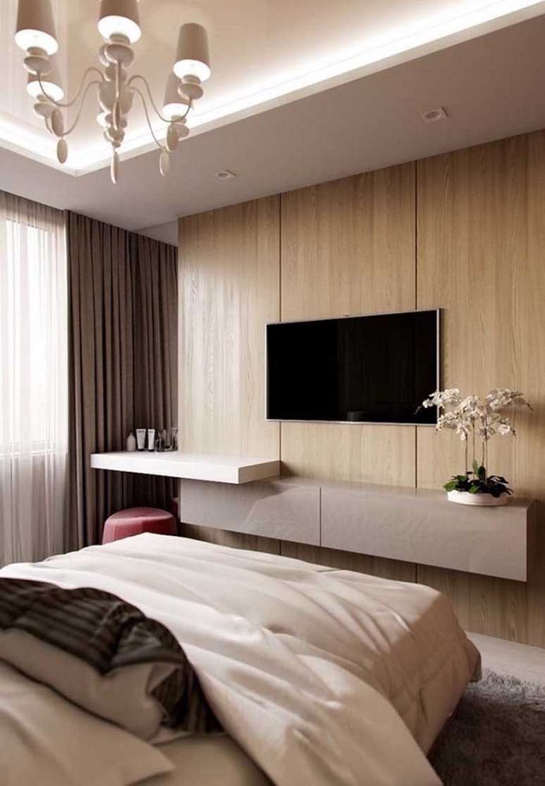 53. Rack minimalista para quarto planejado com painel para tv e vaso de flores na decora&ccedil;&atilde;o &ndash; Foto Decor Facil