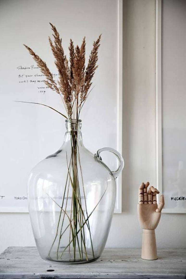 44. As flores secas em garrafa &eacute; algo muito comum. Foto: Casa Vogue