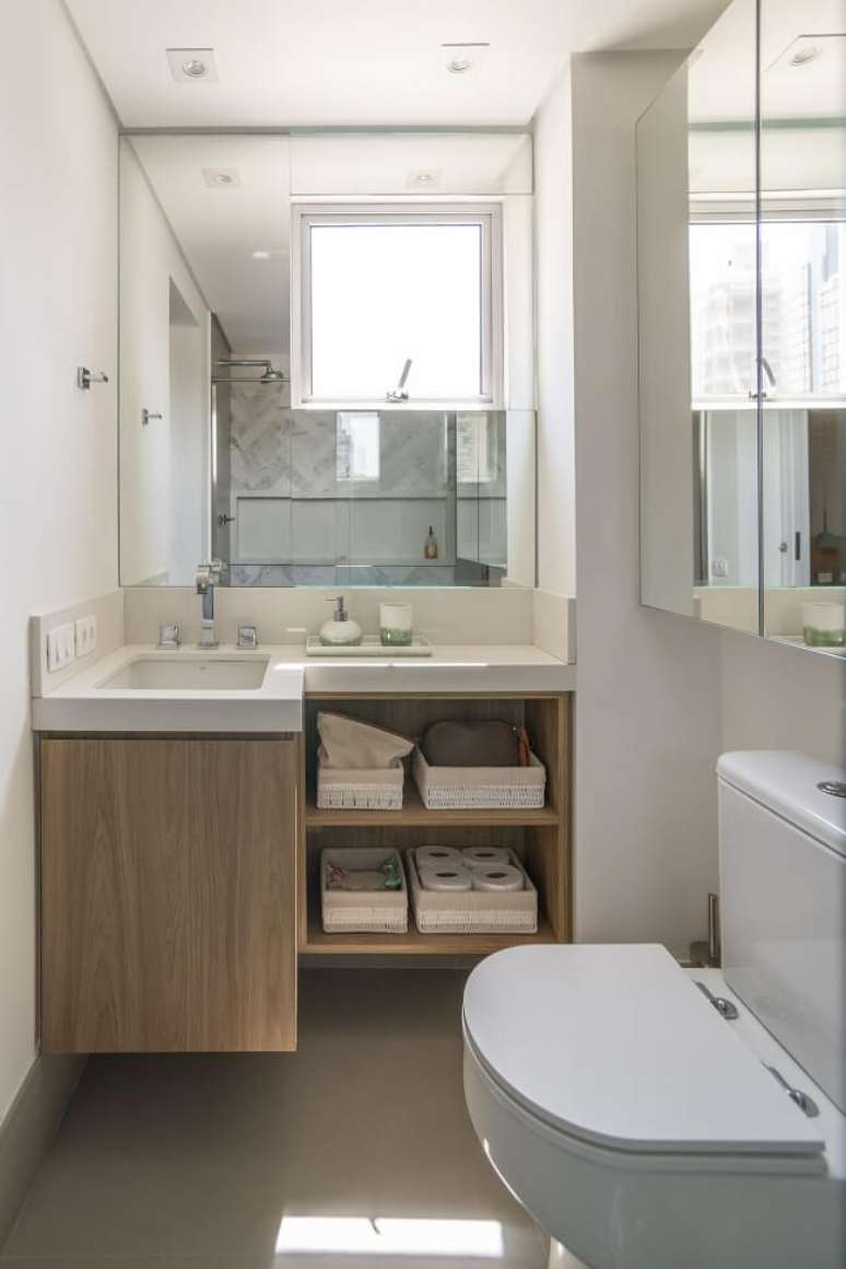 9. Gabinete planejado e cuba para banheiro pequeno. Fonte: Isabela Fraia Arquitetura