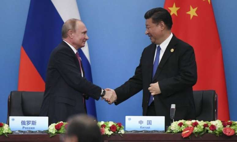 China e Rússia são grandes aliados e suposto pedido foi feito durante a Olimpíada (Foto: AFP / WANG ZHAO)