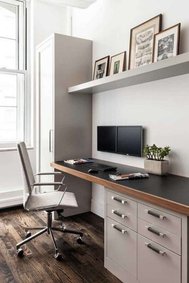 30. Decora&ccedil;&atilde;o simples com m&oacute;veis planejados para home office &ndash; Foto: Archzine