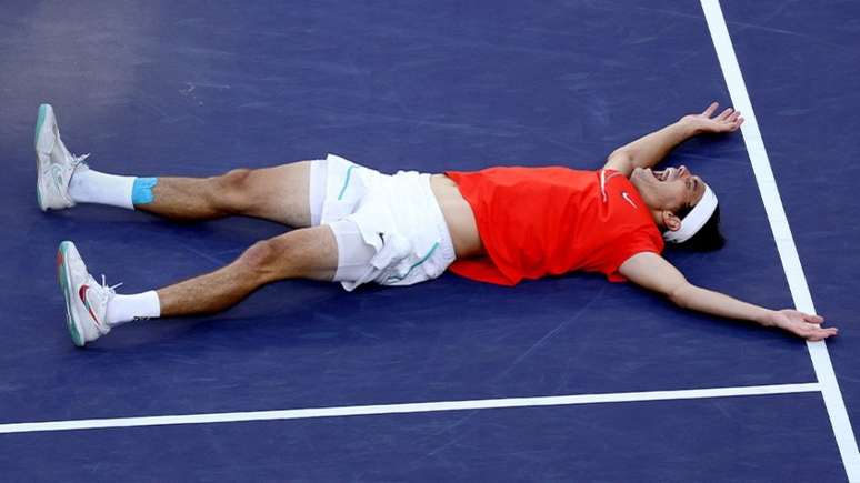 Taylor Fritz teve a maior vitória da carreira, neste domingo, contra Rafael Nadal (MATTHEW STOCKMAN / AFP)