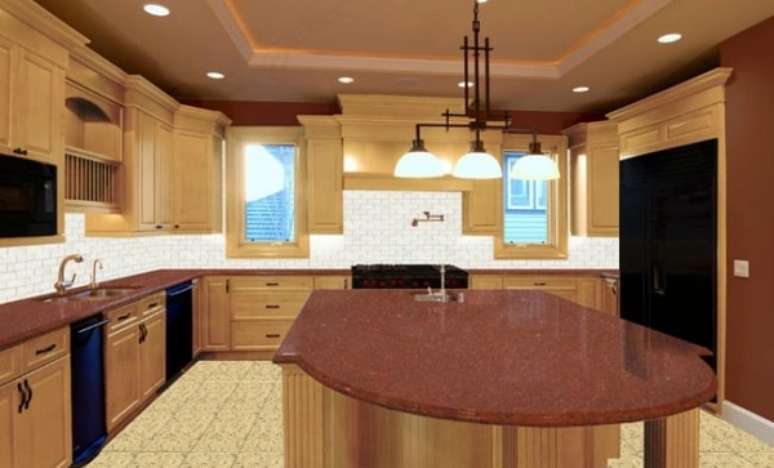 33. Cozinha com bancada e ilha gourmet em granito vermelho &ndash; Foto Casa e Construcao