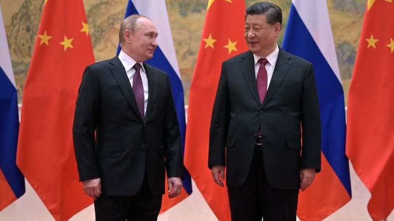 Putin e Xi Jinping reunidos em 4 de fevereiro de 2022, em Pequim