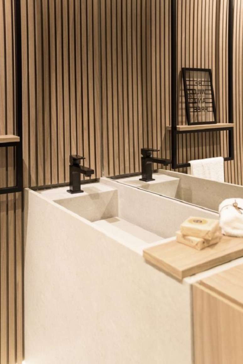 19. Lavabo com porcelanato ripado com bancada esculpida – Foto claudia Albertini Arquitetos Associados