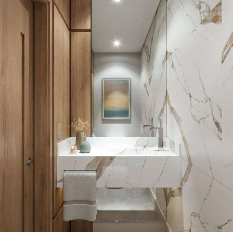 6 &ndash; Quando utilizada no banheiro, a bancada de porcelanato ajuda a ampliar o ambiente. Reprodu&ccedil;&atilde;o: Biancogres