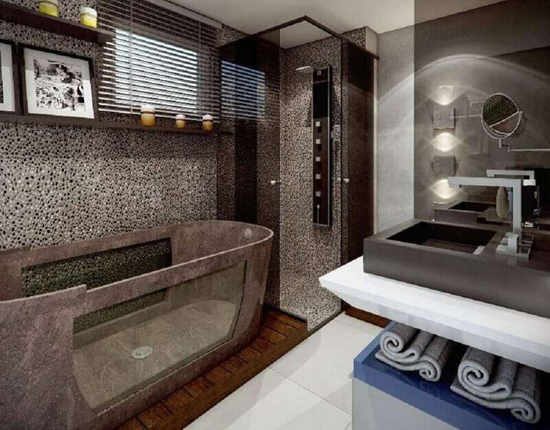 52. Decoração moderna para banheiro cinza com banheira de imersão contemporânea com detalhe de vidro – Foto: Samira Jarouche
