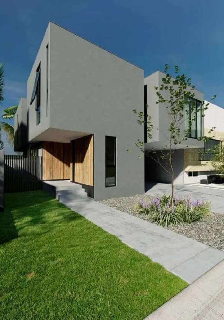 8. A casa com fachada cinza é atemporal e moderna. Fonte: Decor Fácil