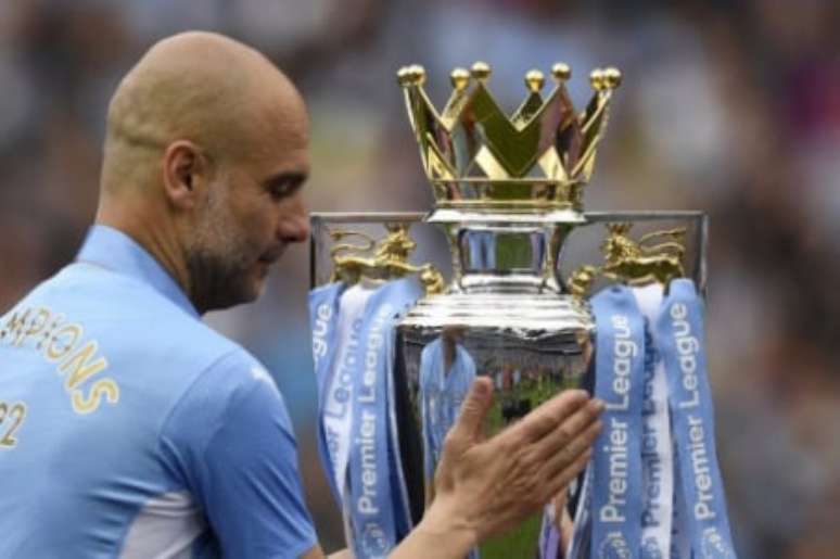 Guardiola conquista sua quarta Premier League (Foto: Oli SCARFF / AFP)