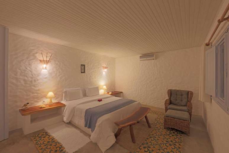 Decora&ccedil;&atilde;o clean e clima intimista nos quartos da pousada.