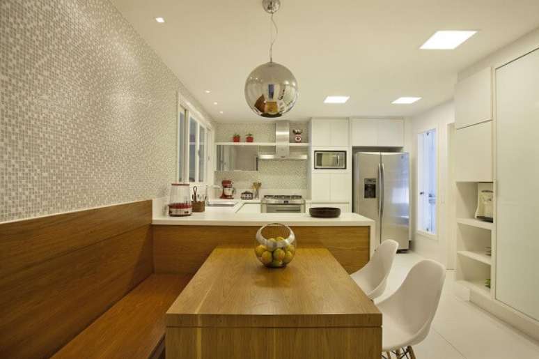 52. Cozinha clean com canto alemão de madeira planejado – Foto Lamego Mancini Arquitetura