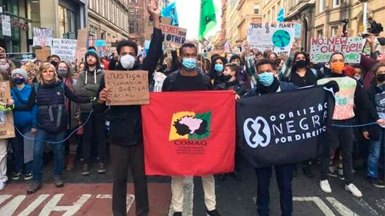 Pessoas negras protestam na COP 26