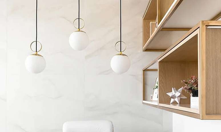 Ou coloc&aacute;-los em diferentes alturas. Projeto de Amanda Miranda.