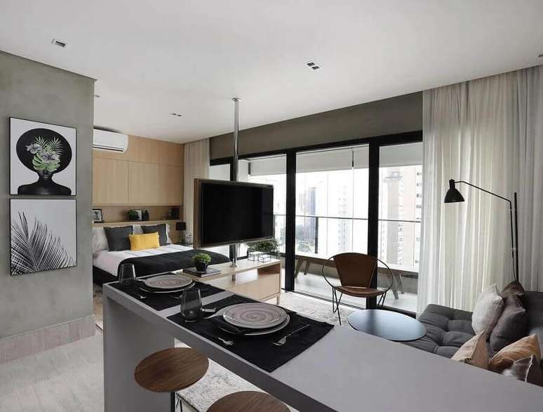 5. Decora&ccedil;&atilde;o de aparamento de solteiro pequeno com espa&ccedil;os integrados &ndash; Foto: Bianca D&rsquo;angelo