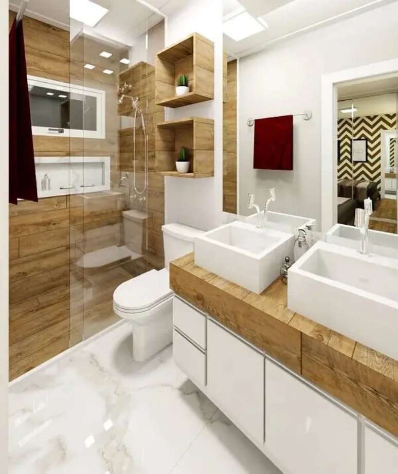 64. Tons terrosos: banheiro de madeira com armário planejado. Fonte: Estudio Nova