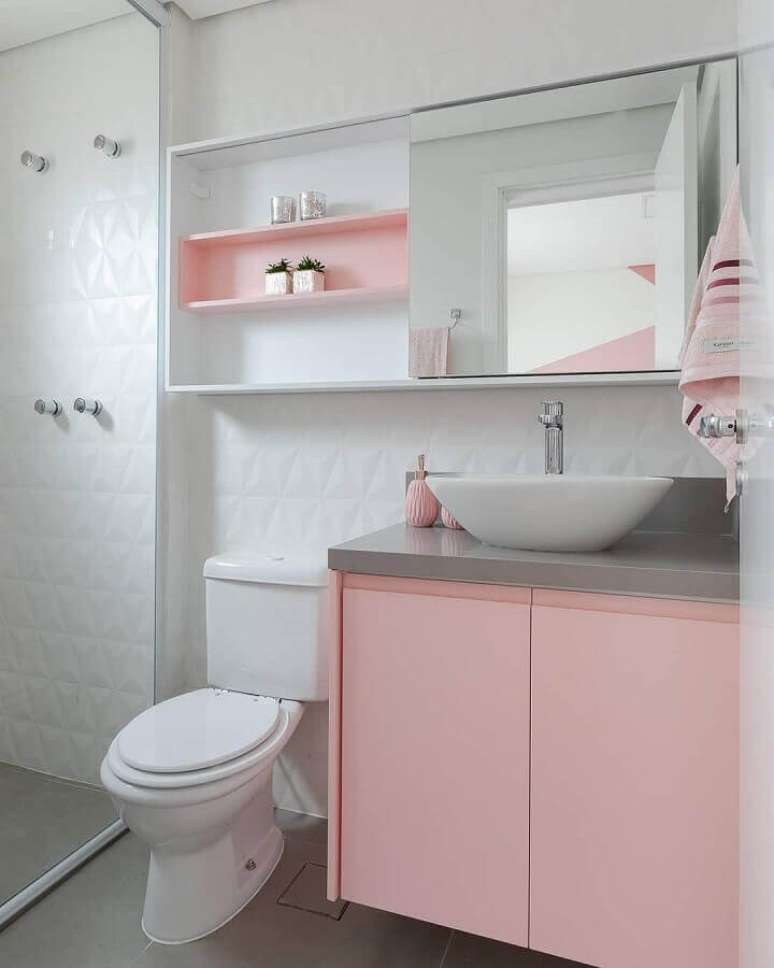 12. Decoração clean para banheiro branco com nicho e gabinete planejado em rosa candy colors – Foto: Webcomunica