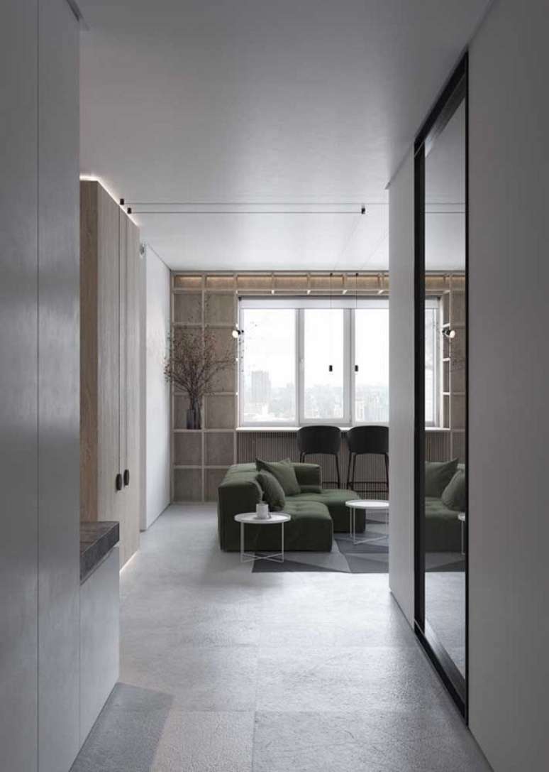 36. Porcelanato para sala de estar cinza com sofá verde – Foto Decor Facil