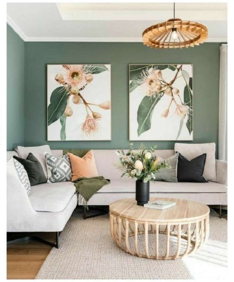 65. Sofá com manta verde para sala de estar moderna – Foto CREA