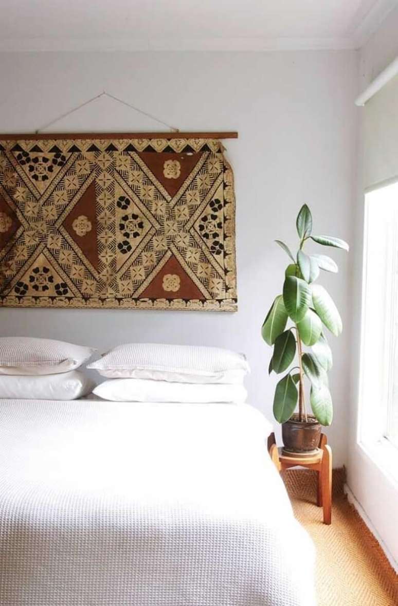 24. Decoração de quarto clean com tapeçaria de parede. Fonte: Decor Fácil