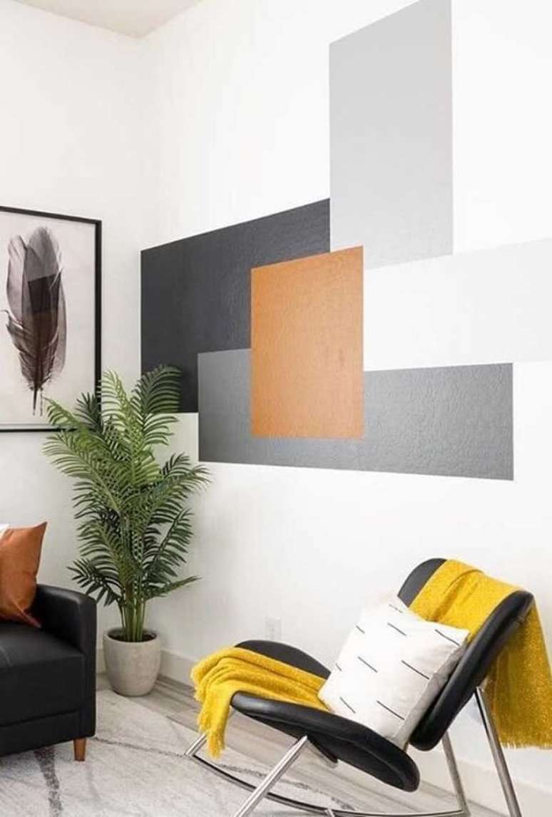 6. Pintar parede com fita crepe quebre a neutralidade da parede com a pintura geométrica. Fonte: Decor Fácil