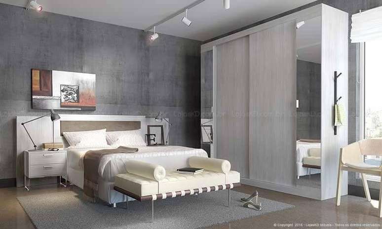 15. Quarto de casal com recamier branco com almofadas laterais. Projeto de LojasKD