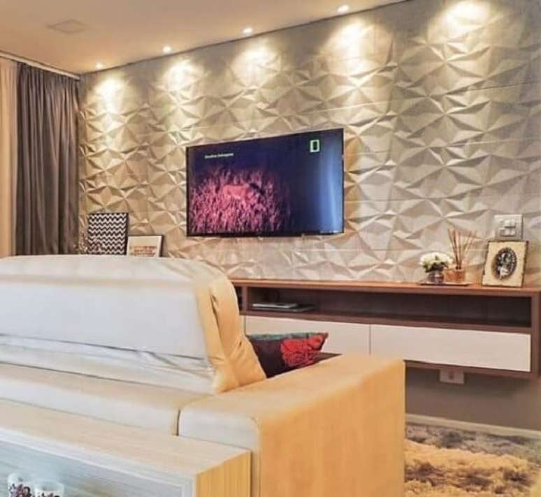 50. Rack suspenso e painel de gesso para sala de TV. Fonte: Total Constru&ccedil;&atilde;o