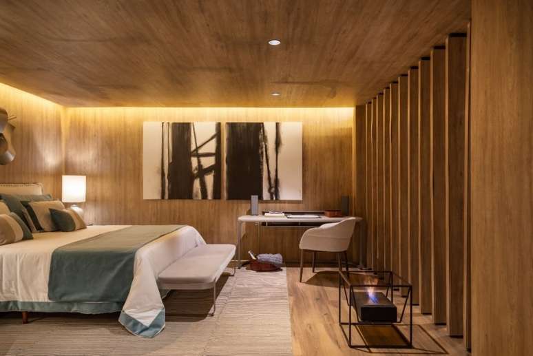 No quarto assinado por Rog&eacute;rio Perez e Eleonora Perez para a Mostra B&C, a lareira ecol&oacute;gica Eco 52, da Ecofireplaces (@ecofireplaces), deixa o ambiente ainda mais acolhedor