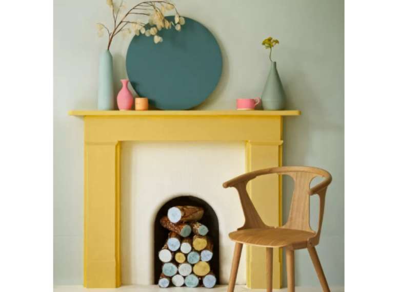 Fa&ccedil;a da lareira um ponto focal com a pintura