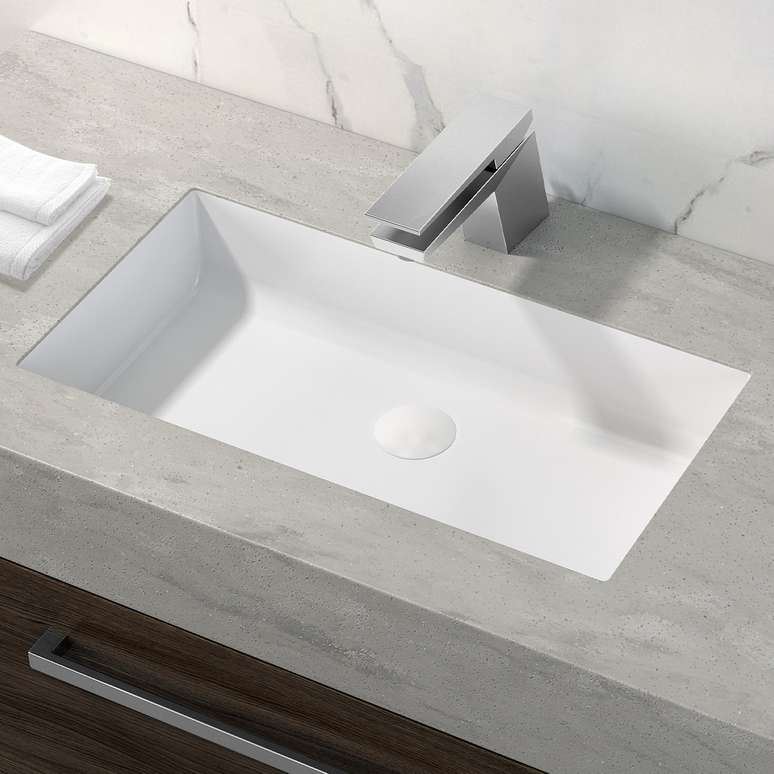 10. Bancada de corian bege e branco para cozinha – Foto Corian