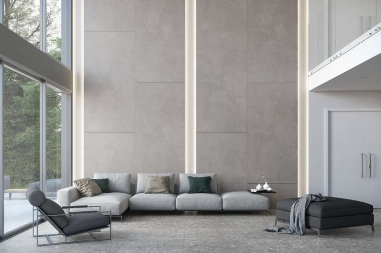 Porcelanatos Asfalto AC (120x140), na parede, e Iseo Grigio AC (90x90), no piso, ambos da Eliane (@elianerevestimentos) criam um ambiente contemporâneo e elegante