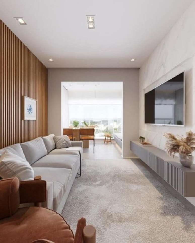 9. O rack nunca deve ultrapassar o tamanho da sua parede. Fonte: Camila Morbini Arquitetura