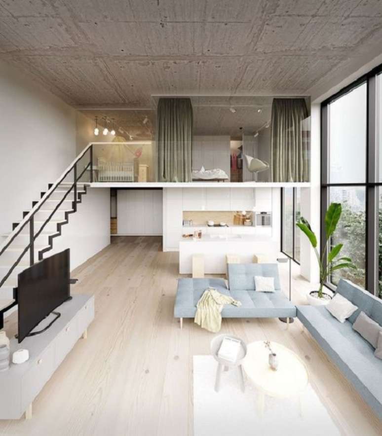 40. Loft pequeno com sof&aacute; azul claro &ndash; Foto Behance