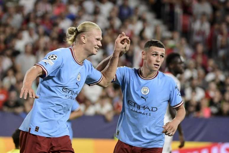 Haaland e Foden fizeram os gols do Manchester City na Espanha (Foto: CRISTINA QUICLER / AFP)