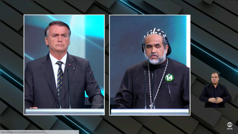 O presidente e candidato à reeleição, Jair Bolsonaro (PL), e o candidato Padre Kelmon (PTB) participam de debate presidencial.