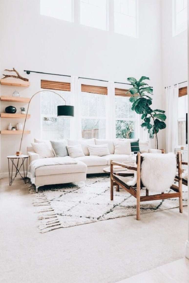 27. Sala de estar com decoração escandinava e manta para sofá – Foto Baby Rock My Day