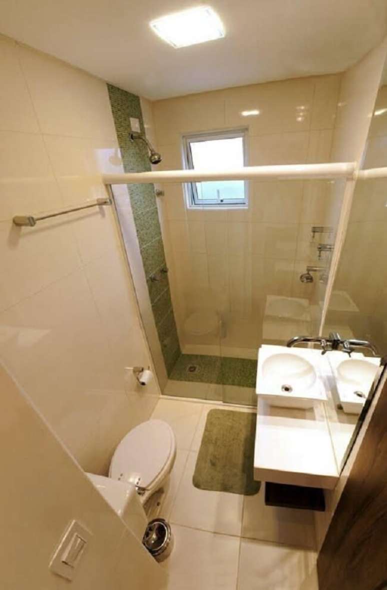 27. Faixa decorativa para banheiro em tom verde. Projeto de Bolda & Bueno Design