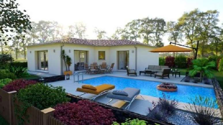 41. Projeto de ed&iacute;cula em L, espregui&ccedil;adeira e ombrelone. Foto &ndash; Clairlande