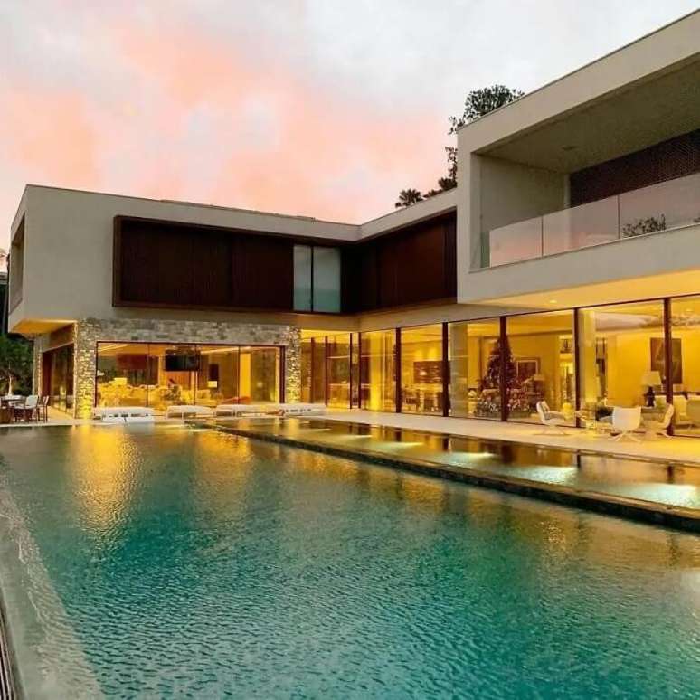 13. Arquitetura moderna para ed&iacute;cula em L. Foto- Roberto Migotto Arquiteto