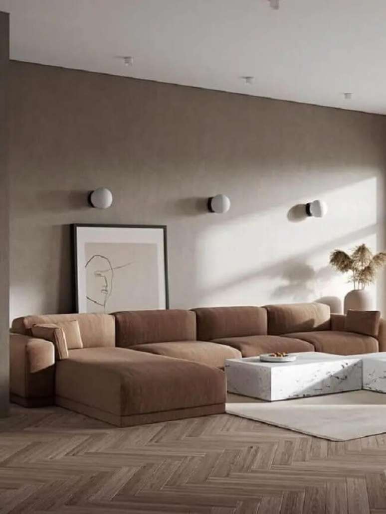 39. Modelo de sof&aacute; minimalista para sala em tom bege. Fonte &ndash; Behance