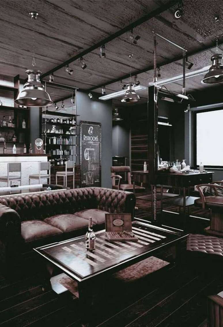 63. Sof&aacute; capiton&ecirc; marca a decora&ccedil;&atilde;o da barbearia retr&ocirc;. Fonte &ndash; Decor Facil