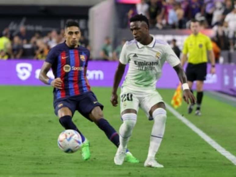 Vini Jr e Raphinha no clássico dos Estados Unidos (Foto: ETHAN MILLER / AFP)