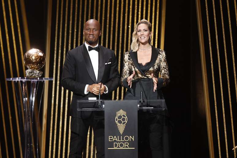 Didier Drogba e Sandy Heribert s&atilde;o os apresentadores do Bola de Ouro 