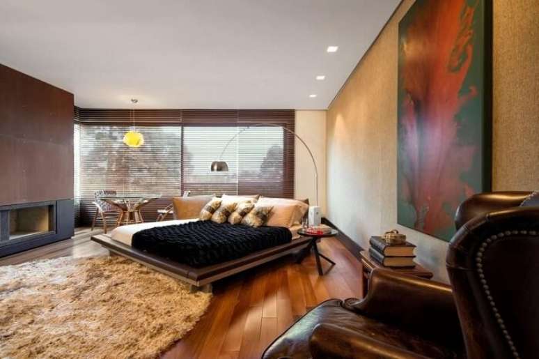 49. Lareira de alvenaria e cama oriental casal. Fonte – Elmor Arquitetura