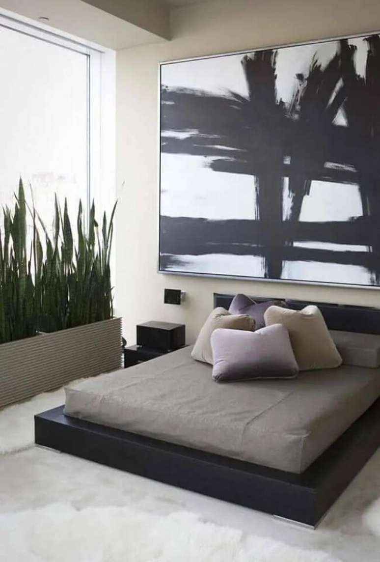 26. Quadro abstrato e cama oriental com base preta. Fonte – Casa e Festa